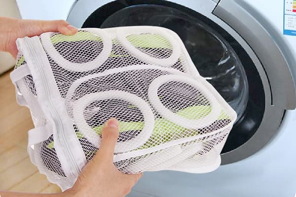 Spordijalatsite pesemine pesumasinas
