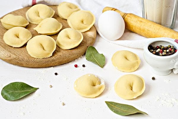 Homemade dumplings, pepper and bay leaf