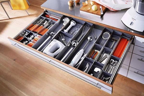 Drawer with kitchen utensils