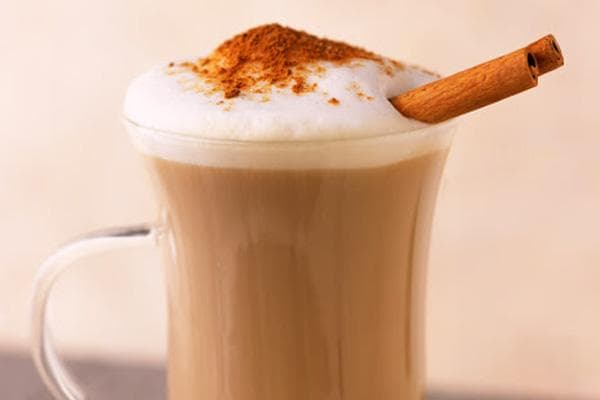 Latte with cinnamon stick