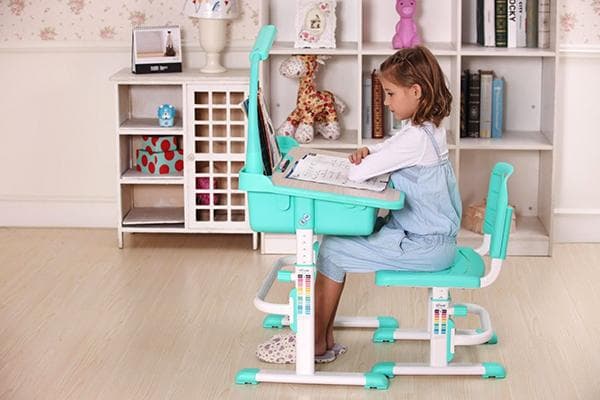 Girl at a children's desk