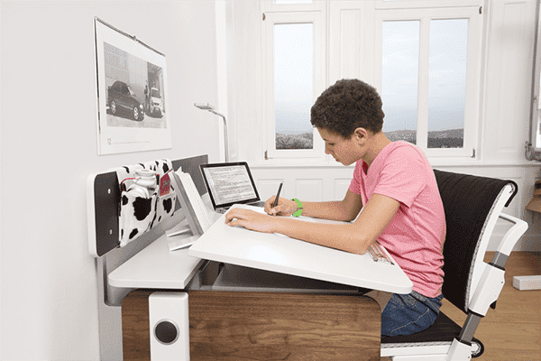 Sloping desk top for a teenager