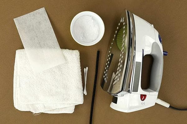 Herramientas prácticas para limpiar la plancha.