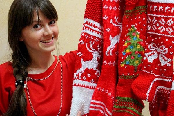 Girl with knitted New Year's things