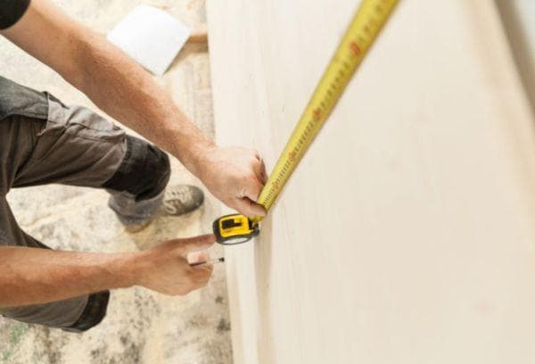 Marking walls with tape measure