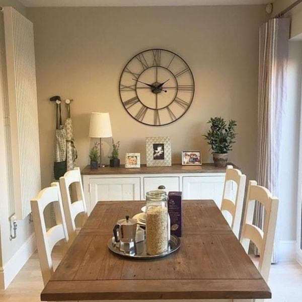 Wall clock near the dining table in the kitchen