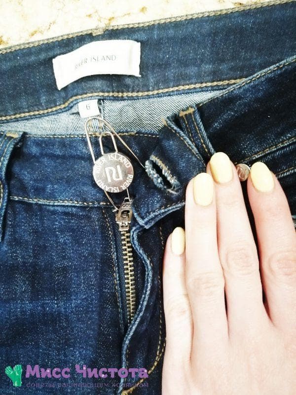 Reparar una cremallera en jeans usando un clip
