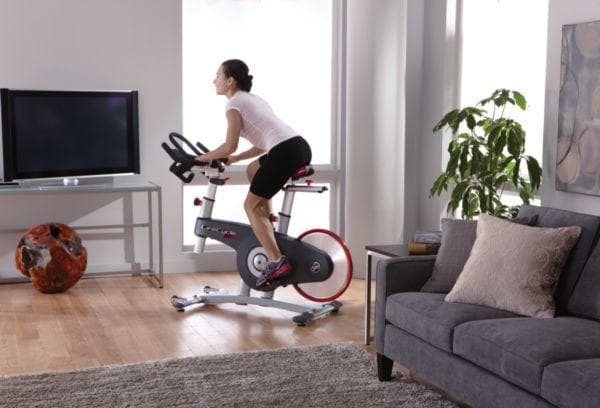 Girl on an exercise bike